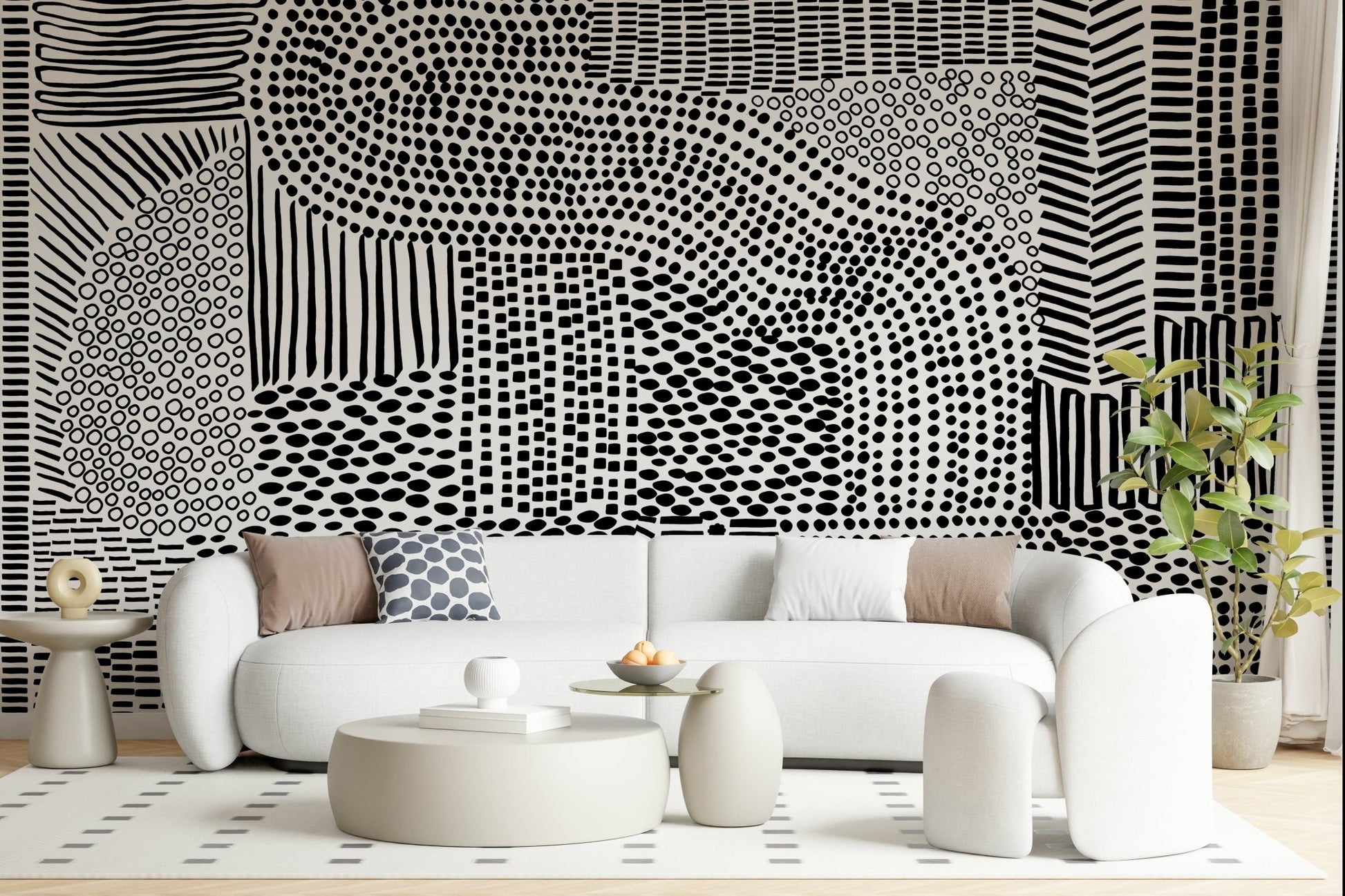 Black And White Maze wallpaper mural behind a white curved boucle sofa and round tables