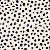 A seamless pattern of irregular dots on a wall

