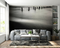 An artistic Mediterranean sea mural on minimalist wallpaper.

