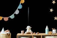 The peel and stick wallpaper on a smooth wall surface.

