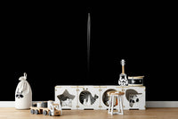 The wallpaper is used to create a feature wall in a dining room.

