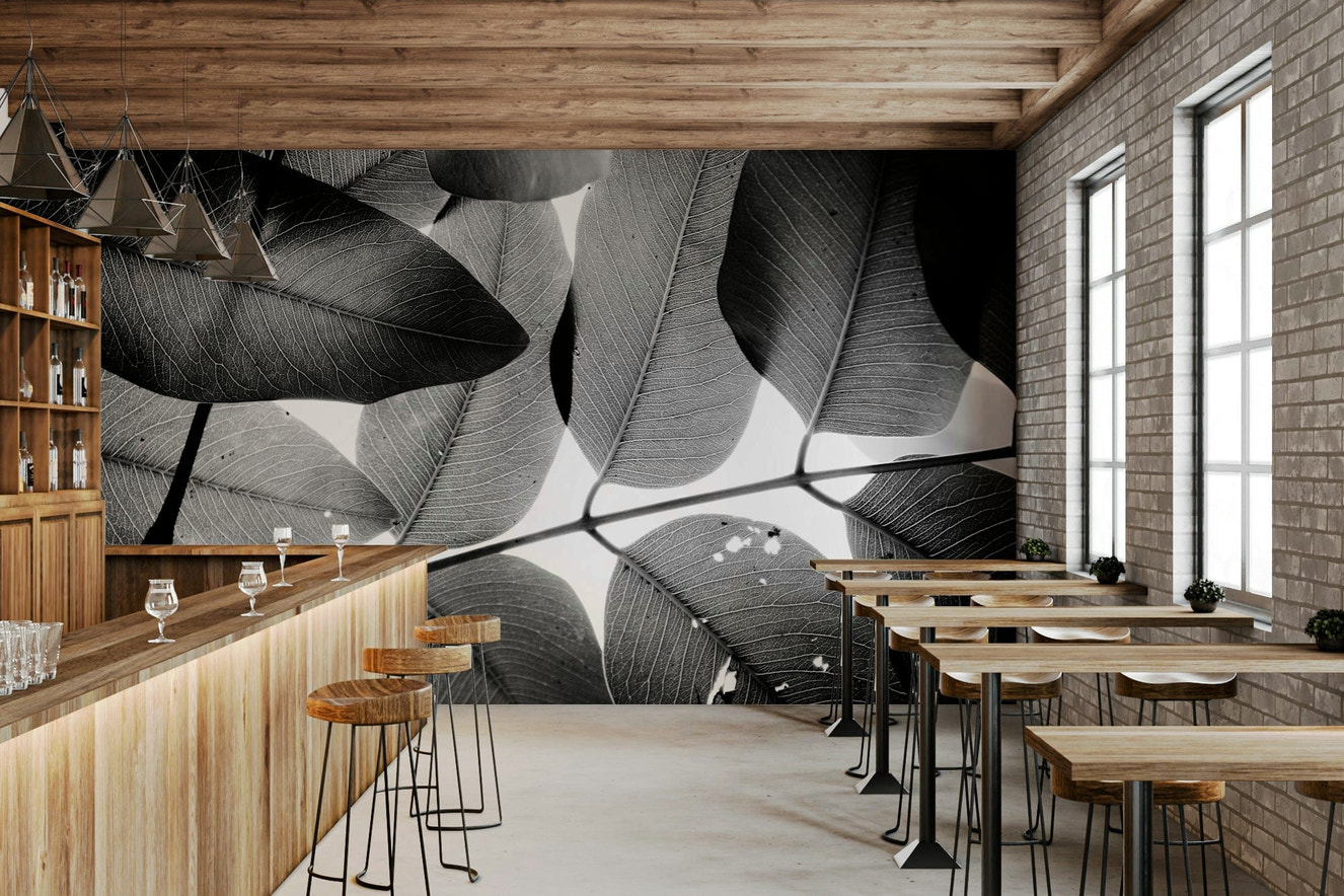 A beautiful botanical wallpaper mural with subtle leaves.

