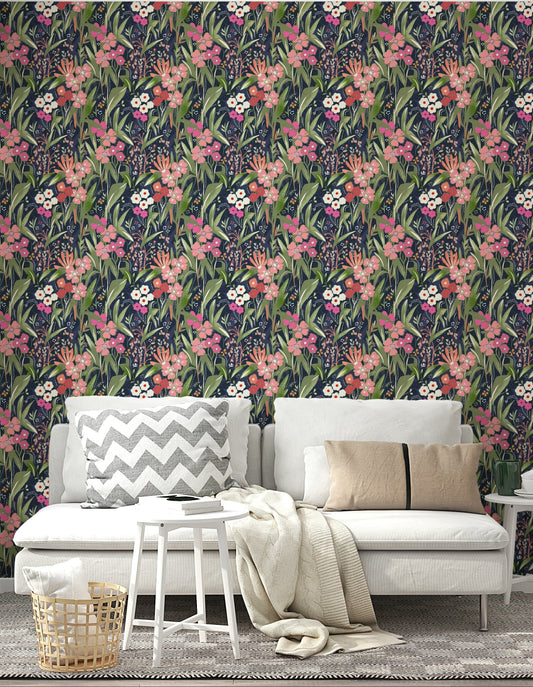 A beautiful modern living room with a dark floral mural.