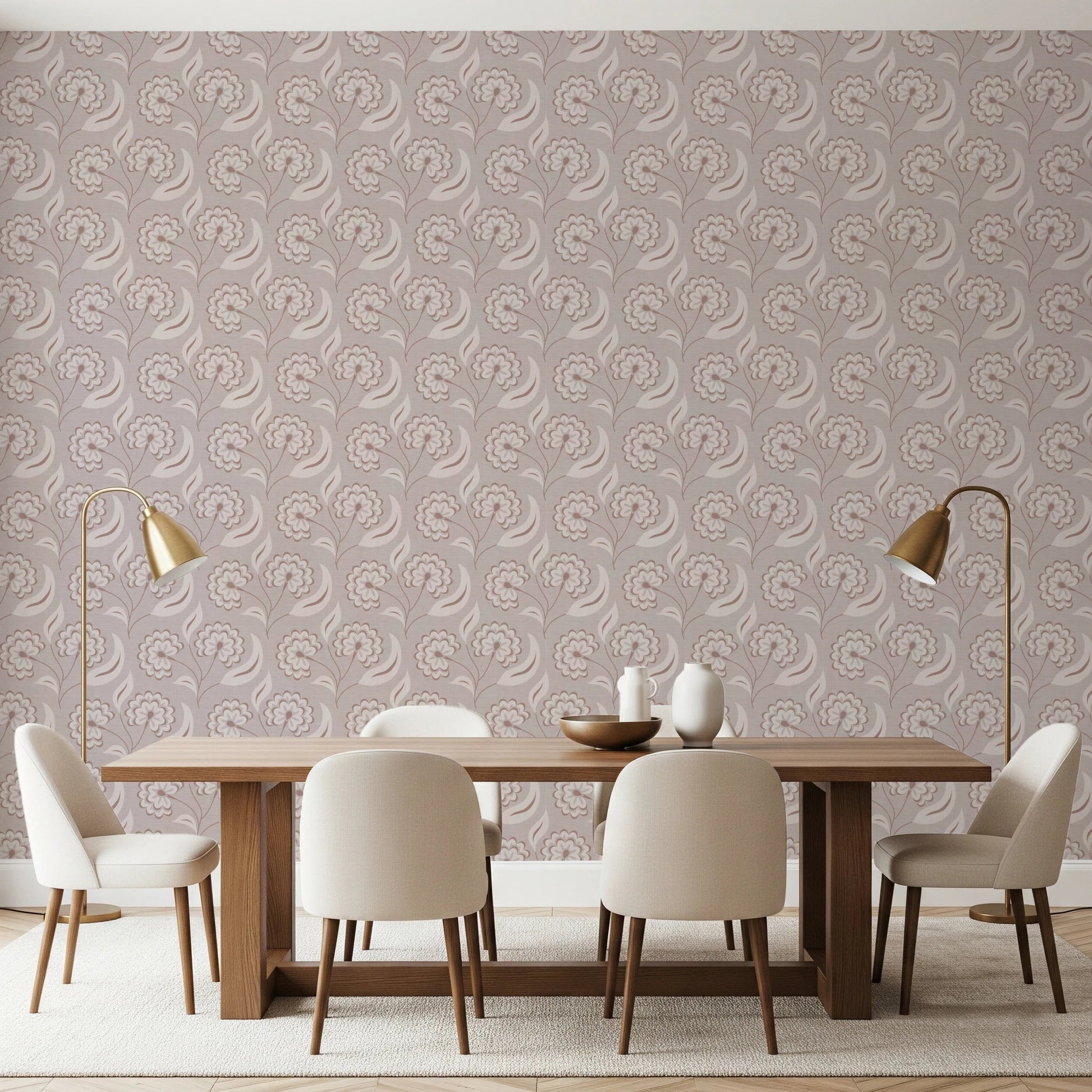 Bloomscape Beige wallpaper in dusty-pink blooms behind a wood dining table and cream chairs with brass lamps