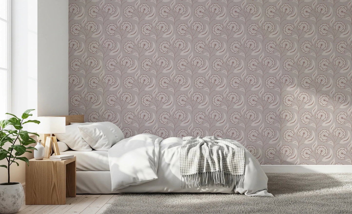 Bloomscape Beige wallpaper in dusty-pink florals behind a low white bed and wood nightstand in a sunlit bedroom