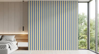 Durable blue and yellow striped wallpaper for a long-lasting feature wall.