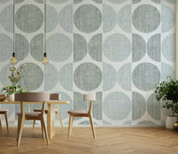 A graceful subtle circle wall mural in cool, light tones.

