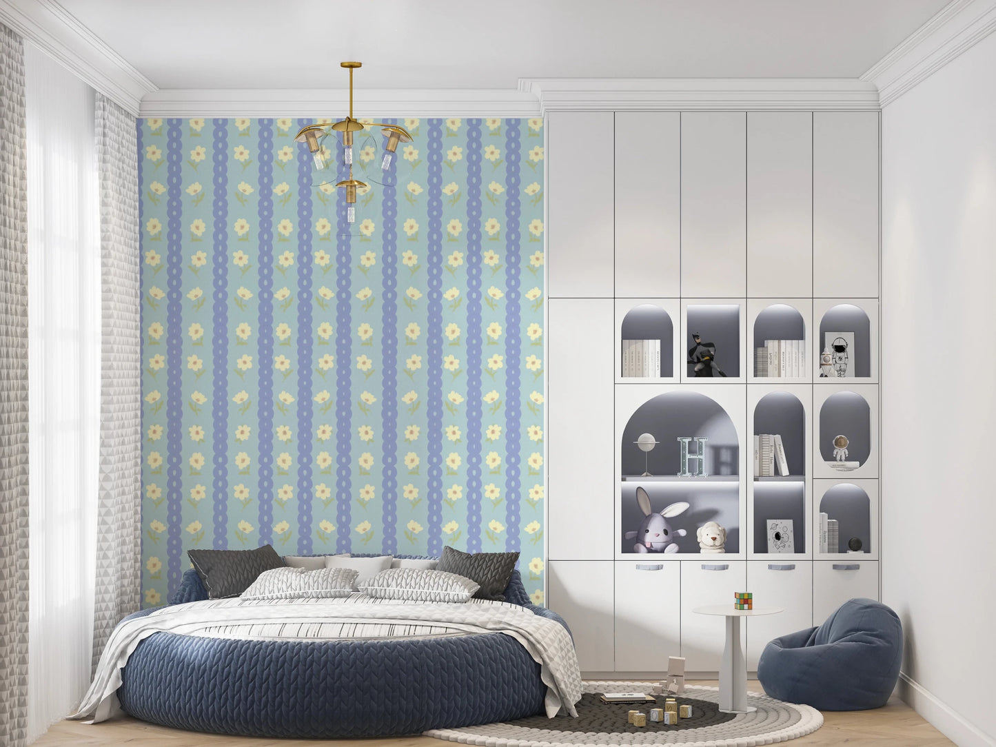 Blue Bloom Stripes wallpaper mural in a kids room with a round blue bed and white toy shelves, blue and yellow
