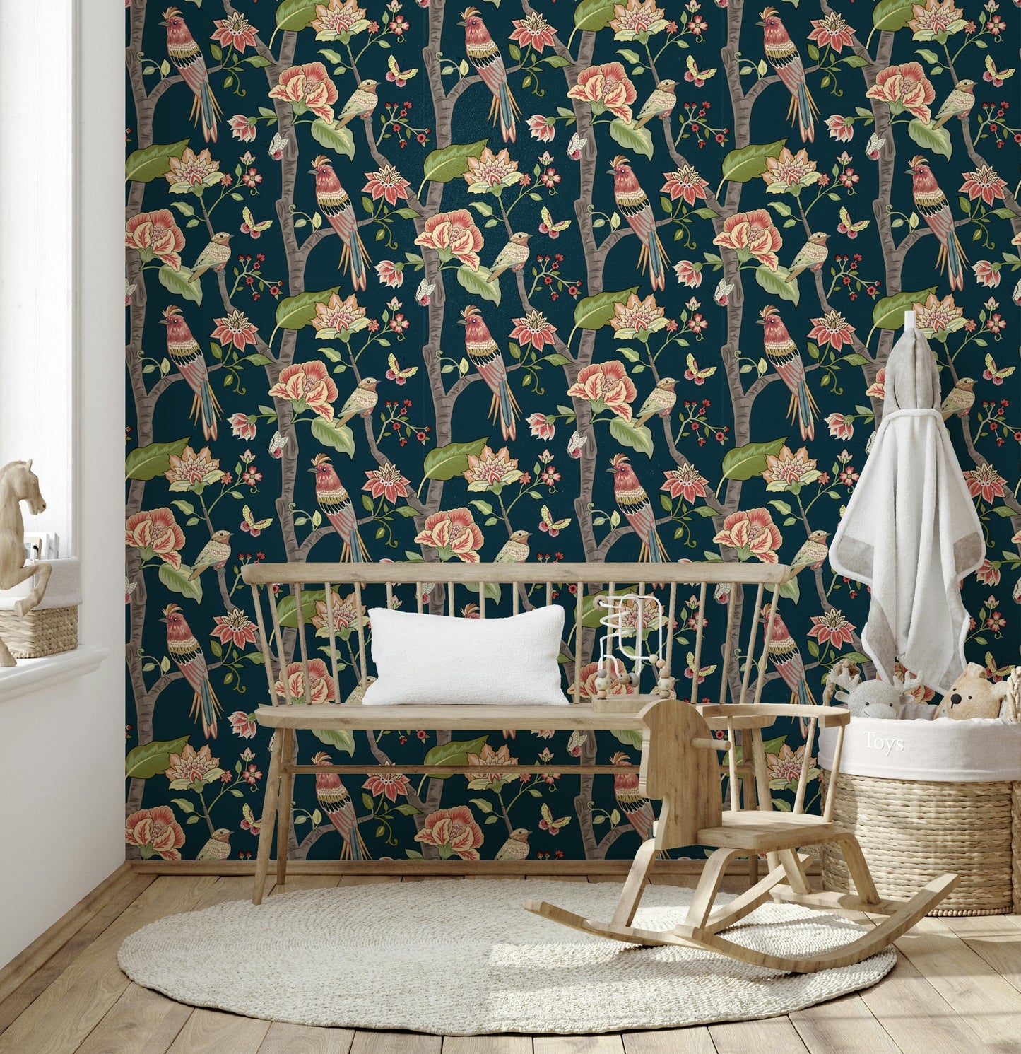 Nature-inspired wallpaper mural with detailed birds, lush green leaves, and pink floral clusters.