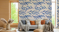 Botanical-themed wallpaper in soothing blue tones for a natural look.