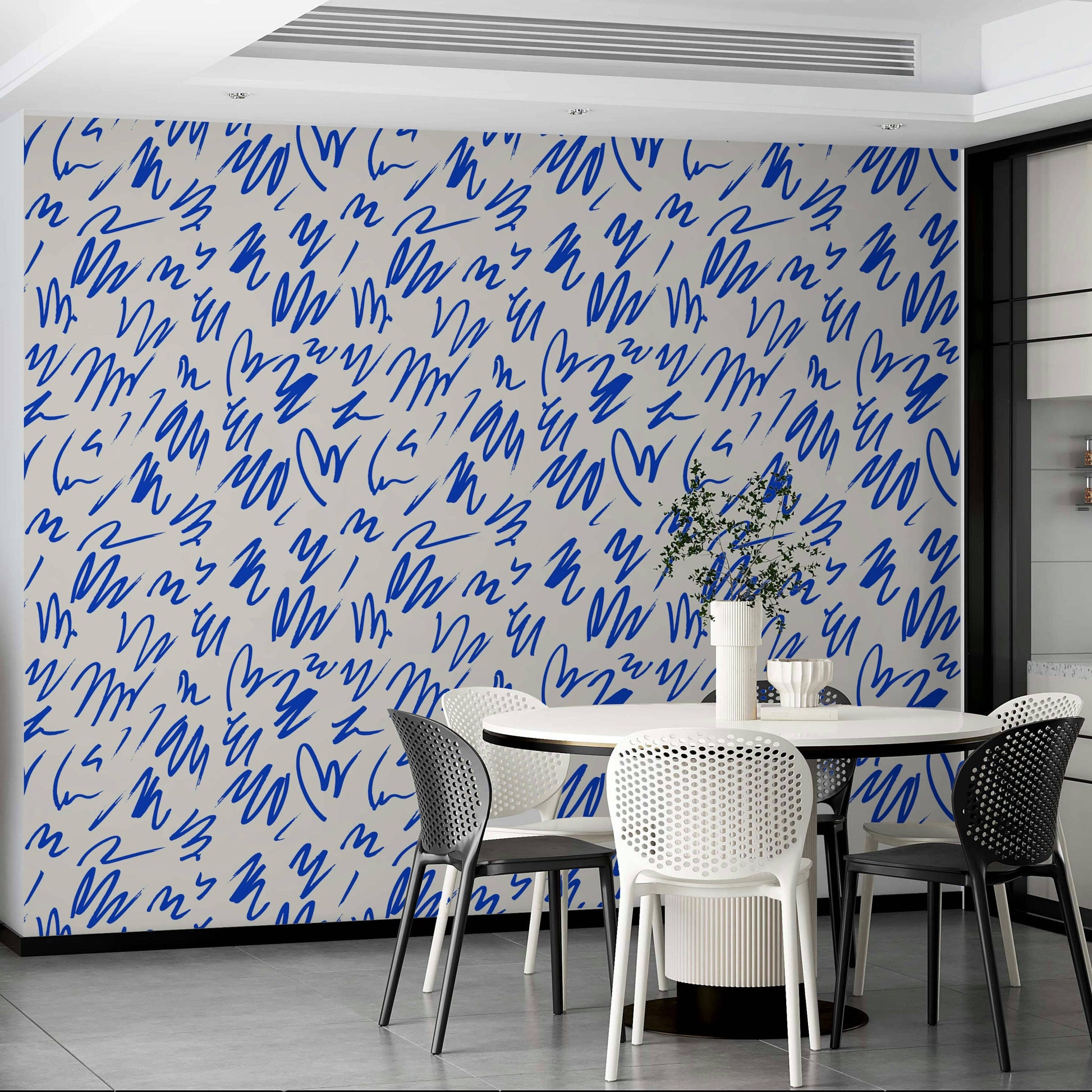 A studio decorated with an abstract wall mural

