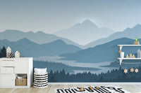Blue Color Foggy Forest Mountain wallpaper mural styled along a hallway feature wall near a console in blue tones
