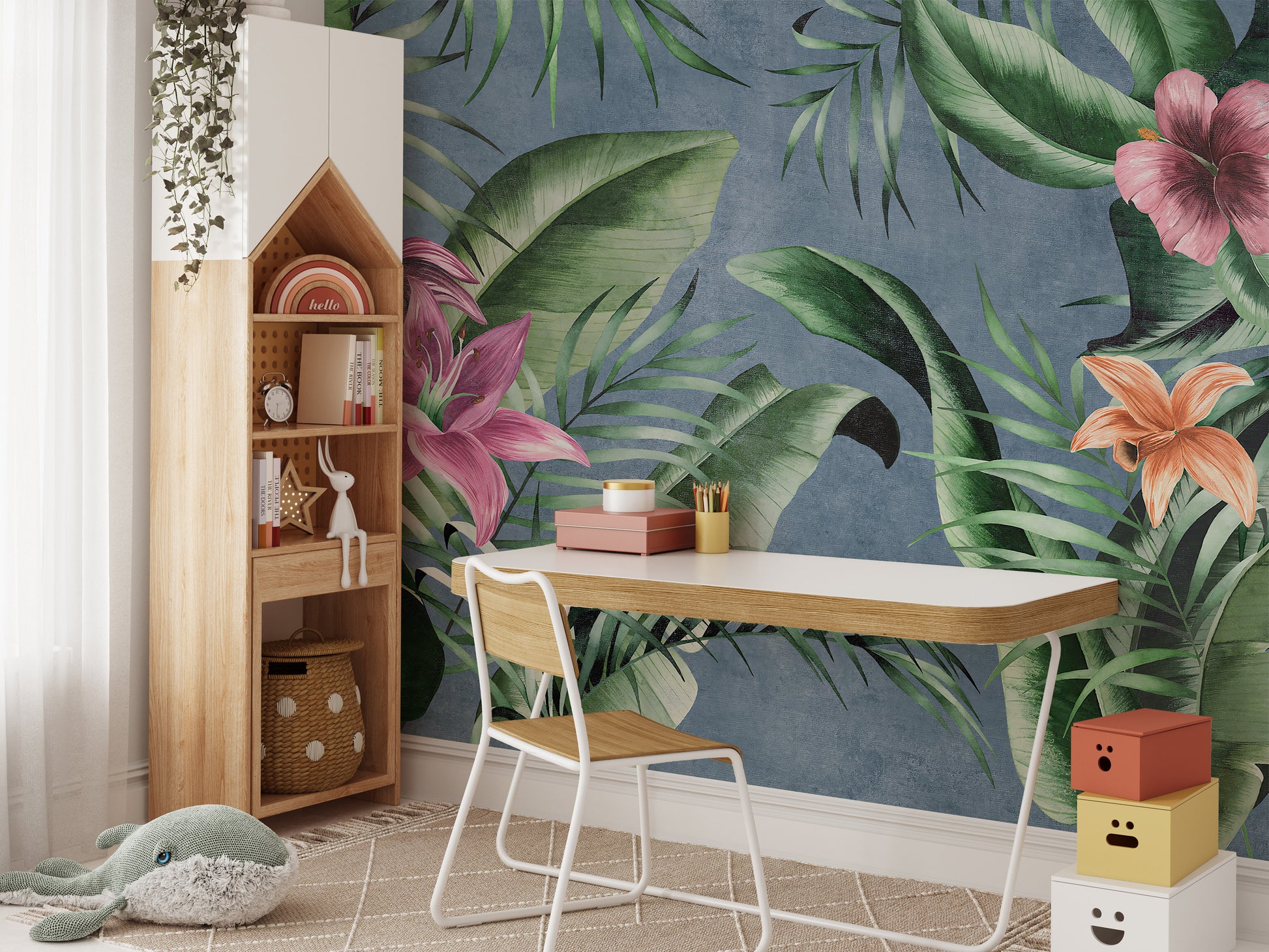 Blue background mural with large green floral leaves design.
