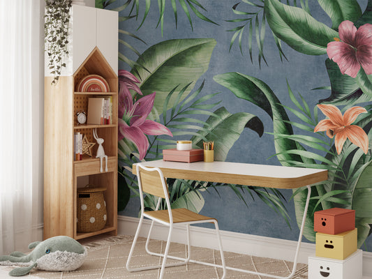 Blue background mural with large green floral leaves design.
