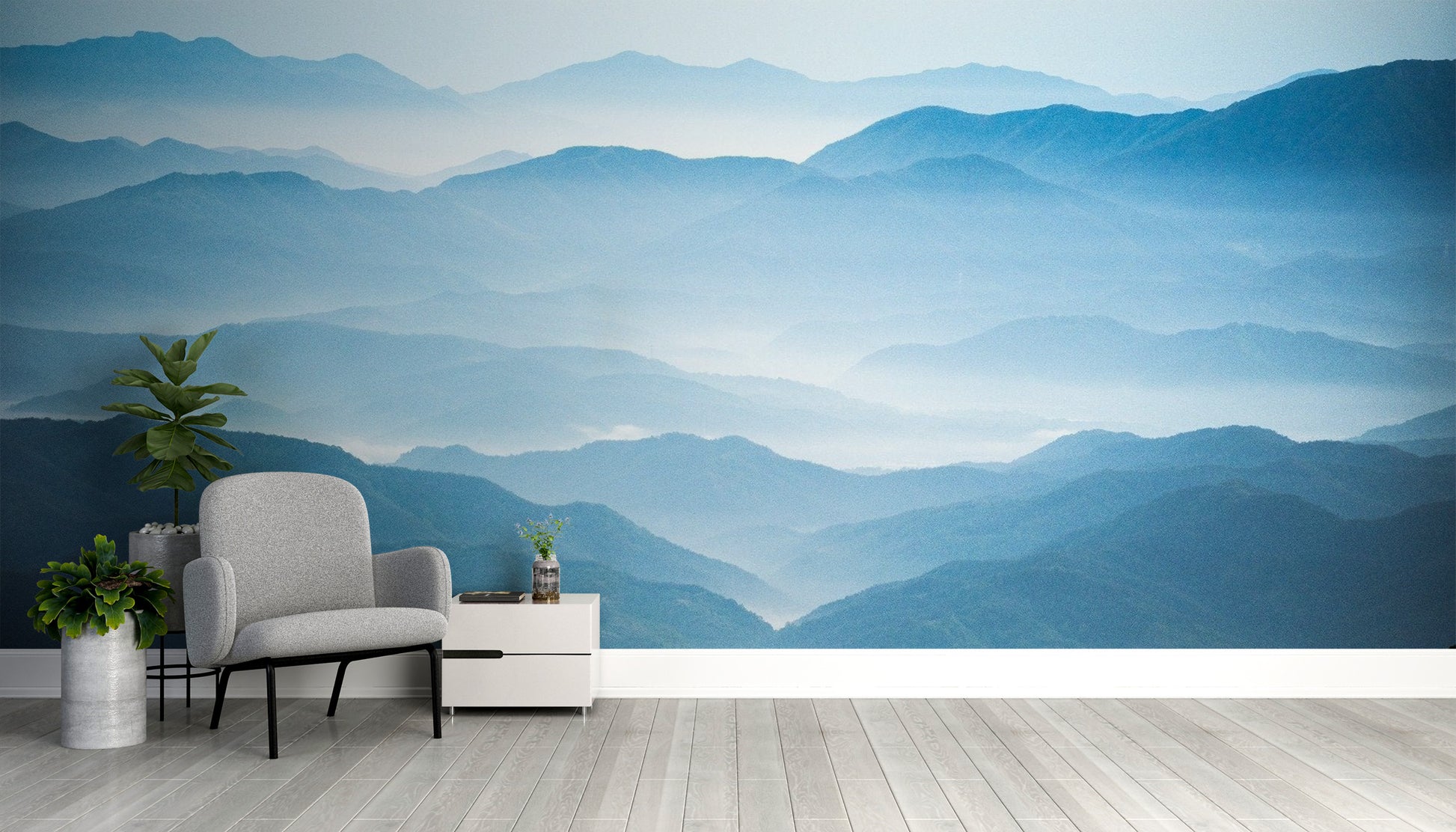 Soft watercolor mountain wallpaper in shades of blue.