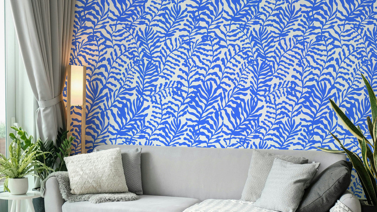 Blue Matisse Leaves Wallpaper on a living room wall

