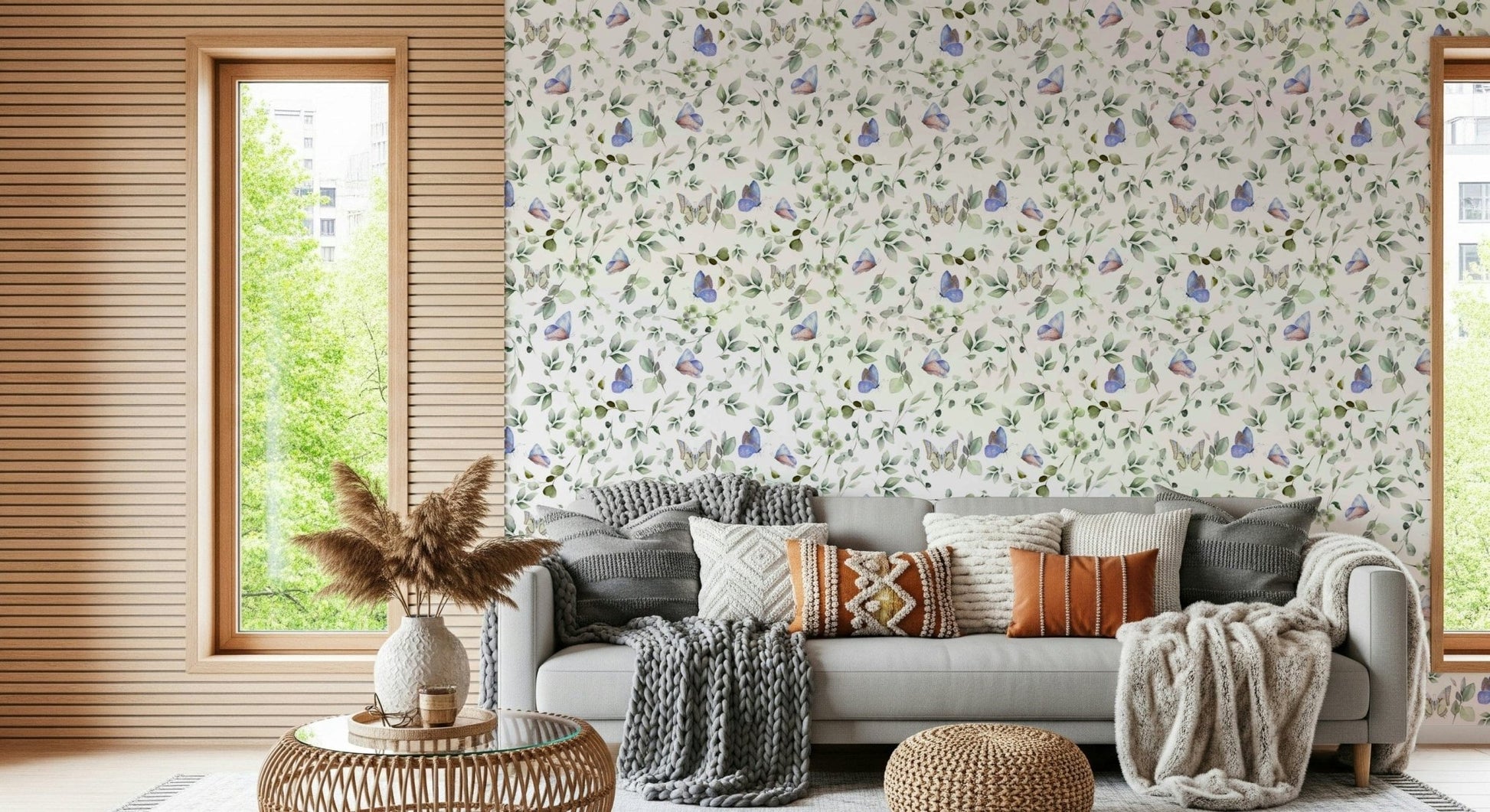 Elegant guest room featuring oversized butterfly prints in a sunlit space.