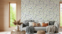 Elegant guest room featuring oversized butterfly prints in a sunlit space.
