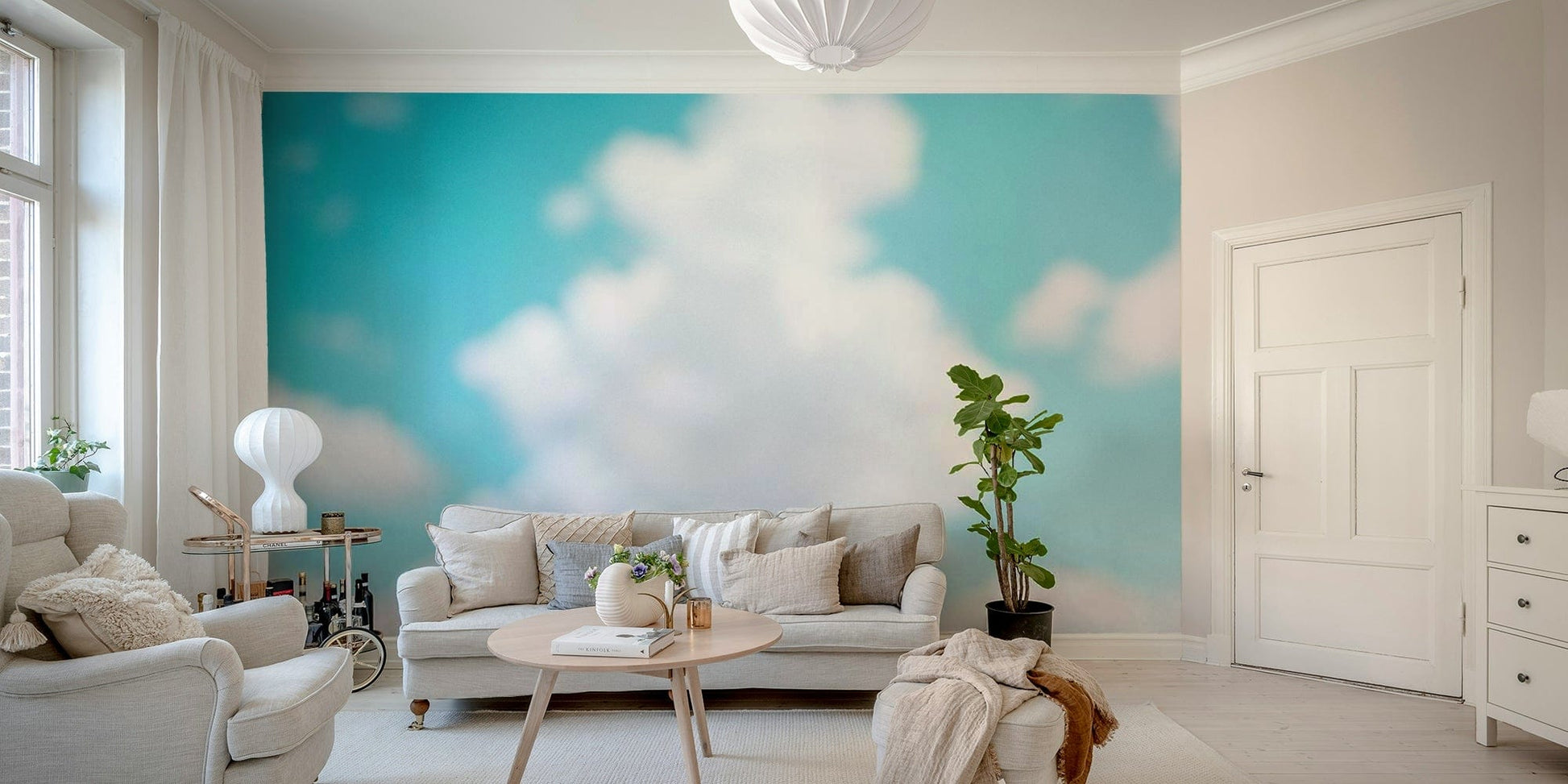 The peel and stick wallpaper showing realistic sky textures.

