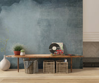 A beautiful abstract blue wallpaper mural with a hazy, flowing texture.