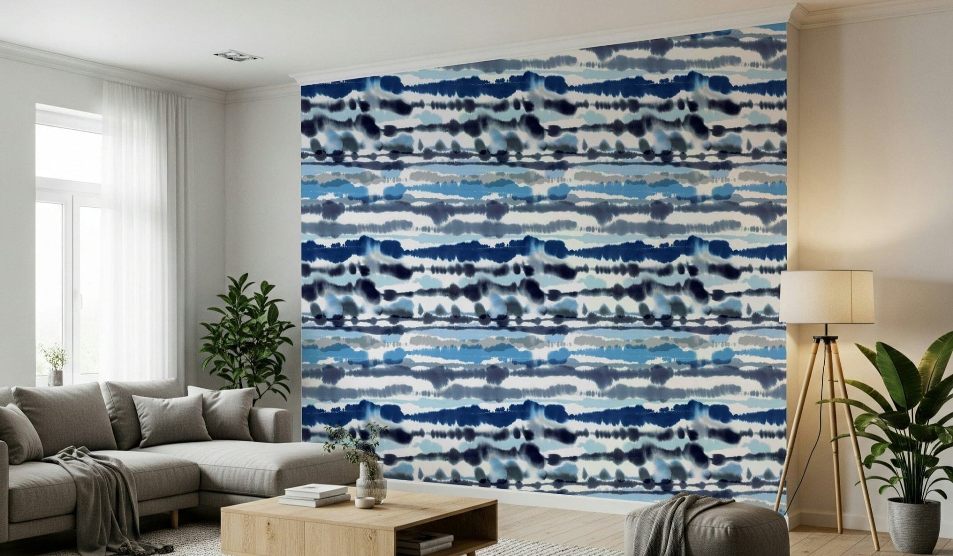 Living room feature wall using Blue Tide Wallpaper in deep navy and sea spray tones.