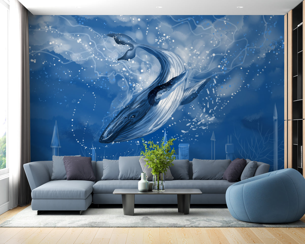 Blue Whale wallpaper mural showing a whale breaching deep blue water behind a grey sectional sofa in a living room