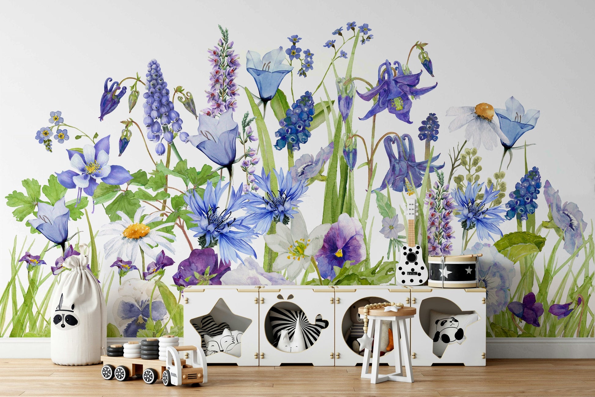 The wall art combines a botanical pattern with soft colors.

