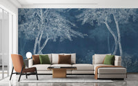 Blue Woods wallpaper mural as a feature wall in a home office workspace in blue tones