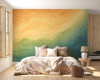 Blue & Yellow Watercolor Ombre wallpaper mural as a bedroom feature wall behind the headboard in blue tones