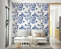 A graceful subtle bloom wall mural in cool, blue tones.

