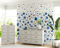 Bluebell Blush Wall Mural behind a white sofa in a family room
