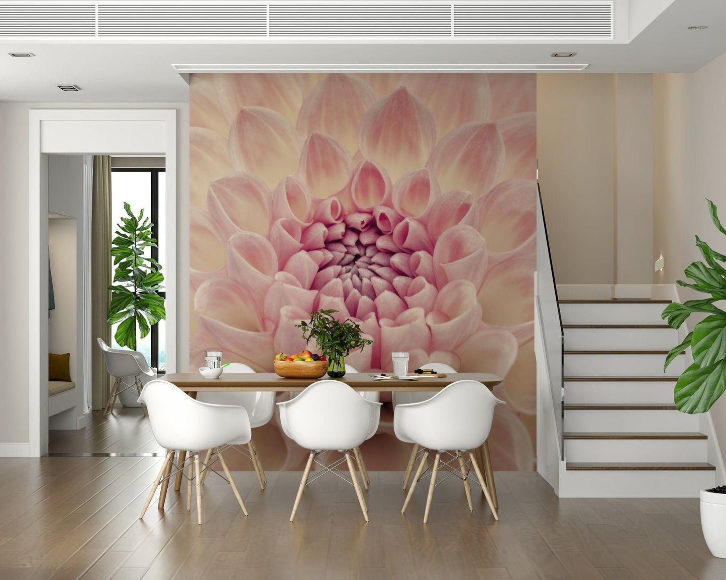 Blush Bloom wallpaper mural of a close-up pink dahlia behind a wood table and white chairs in a dining room