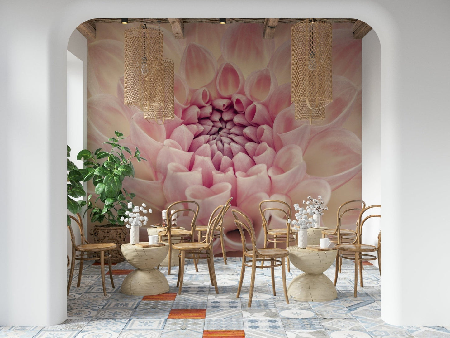 Blush Bloom wallpaper mural of a pink dahlia behind bentwood cafe chairs on a patterned tile floor