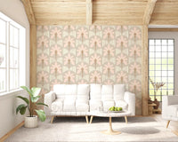 Living room with blush fronds and cream stripe wallpaper in soft taupe neutral tones