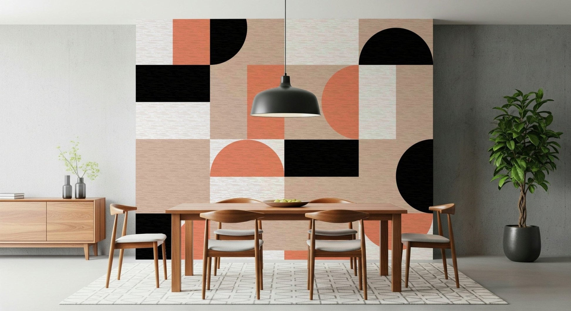 Blush Geometry wallpaper mural behind a wooden dining table and chairs with a black dome pendant lamp