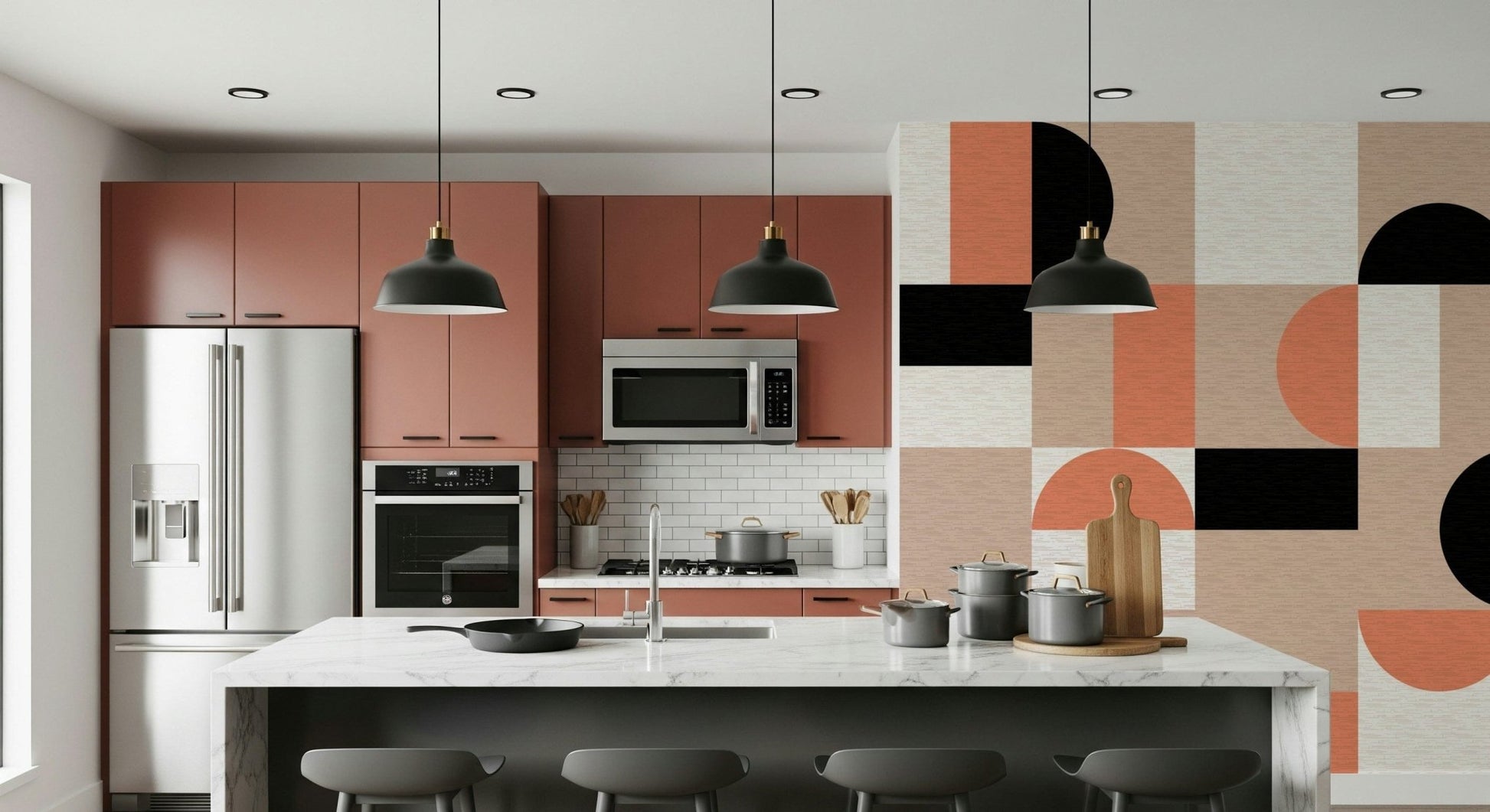 Blush Geometry wallpaper mural accent wall in a kitchen with rust cabinets, marble island and black pendants