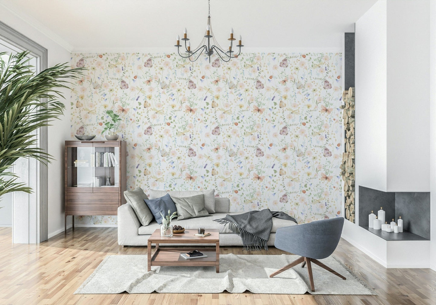 Blush Meadow's Whisper wallpaper with watercolor wildflowers and butterflies behind a beige sofa and grey chair