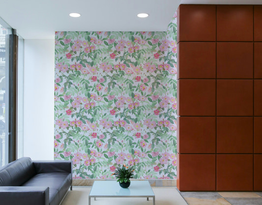 Soft pink floral mural with blooming roses

