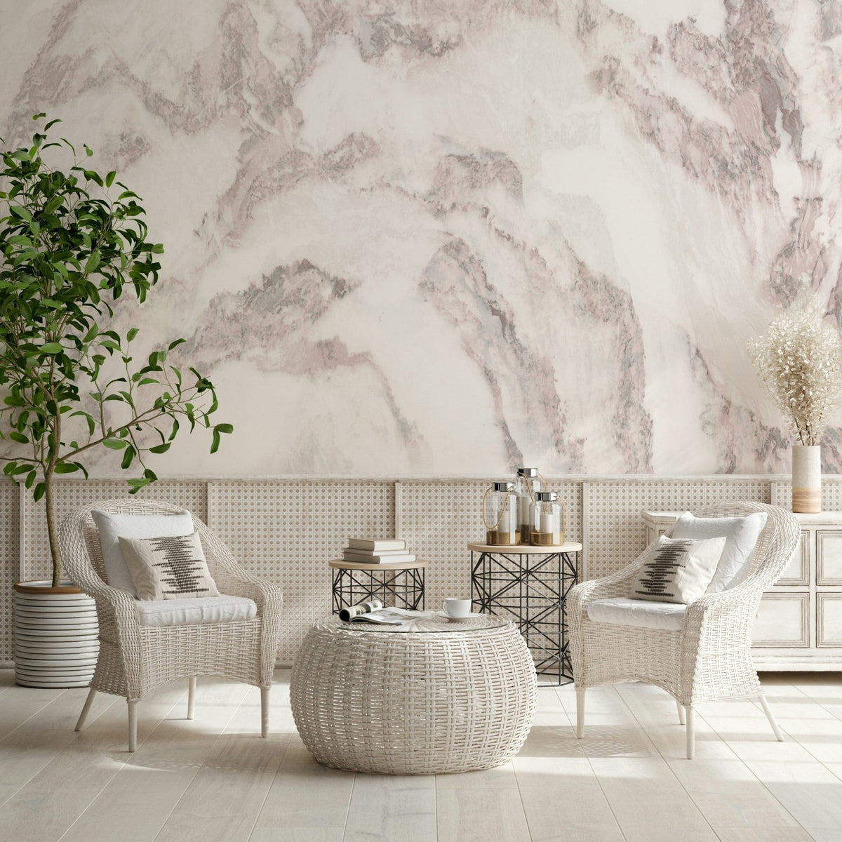 Blush Stone Texture wallpaper mural in blush marble behind white wicker armchairs and a woven table in a sunroom