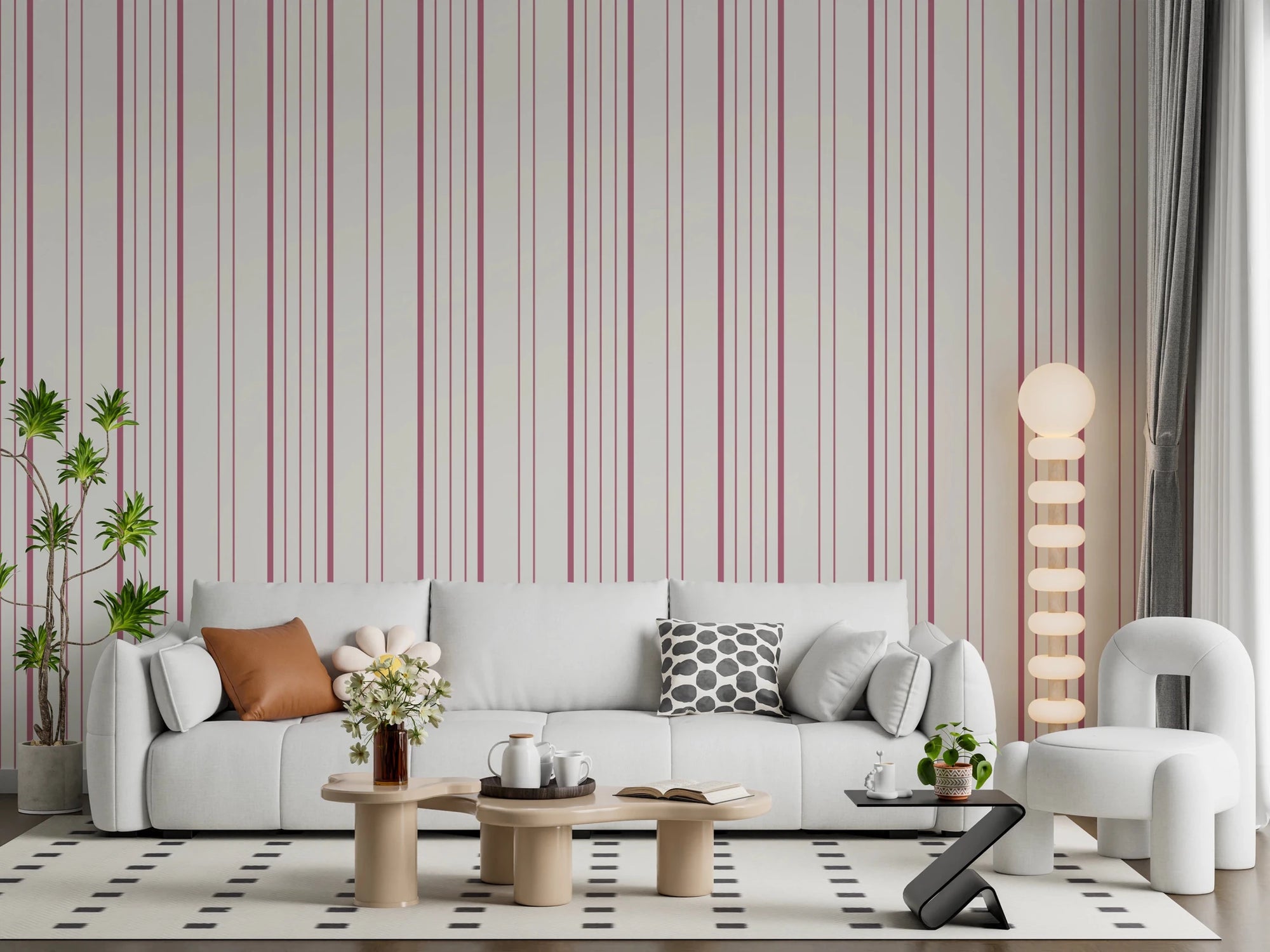 Blush Stripes wallpaper in a living room with white sofa, boucle chair and globe floor lamp