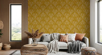 Boho Art Nouveau Folk Floral Mustard Gold wallpaper behind a white sofa with pampas grass in a boho living room
