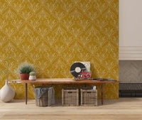 Boho Art Nouveau Folk Floral Mustard Gold wallpaper behind a wood bench with vinyl records in an entryway