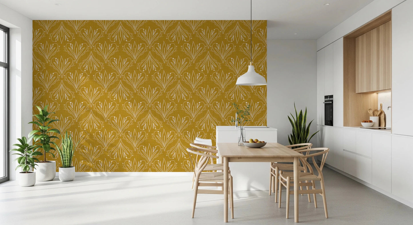 Boho Art Nouveau Folk Floral Mustard Gold wallpaper behind a light wood dining table in a bright modern kitchen