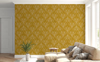 Boho Art Nouveau Folk Floral Mustard Gold wallpaper behind a beige sofa with grey cushions in a living room