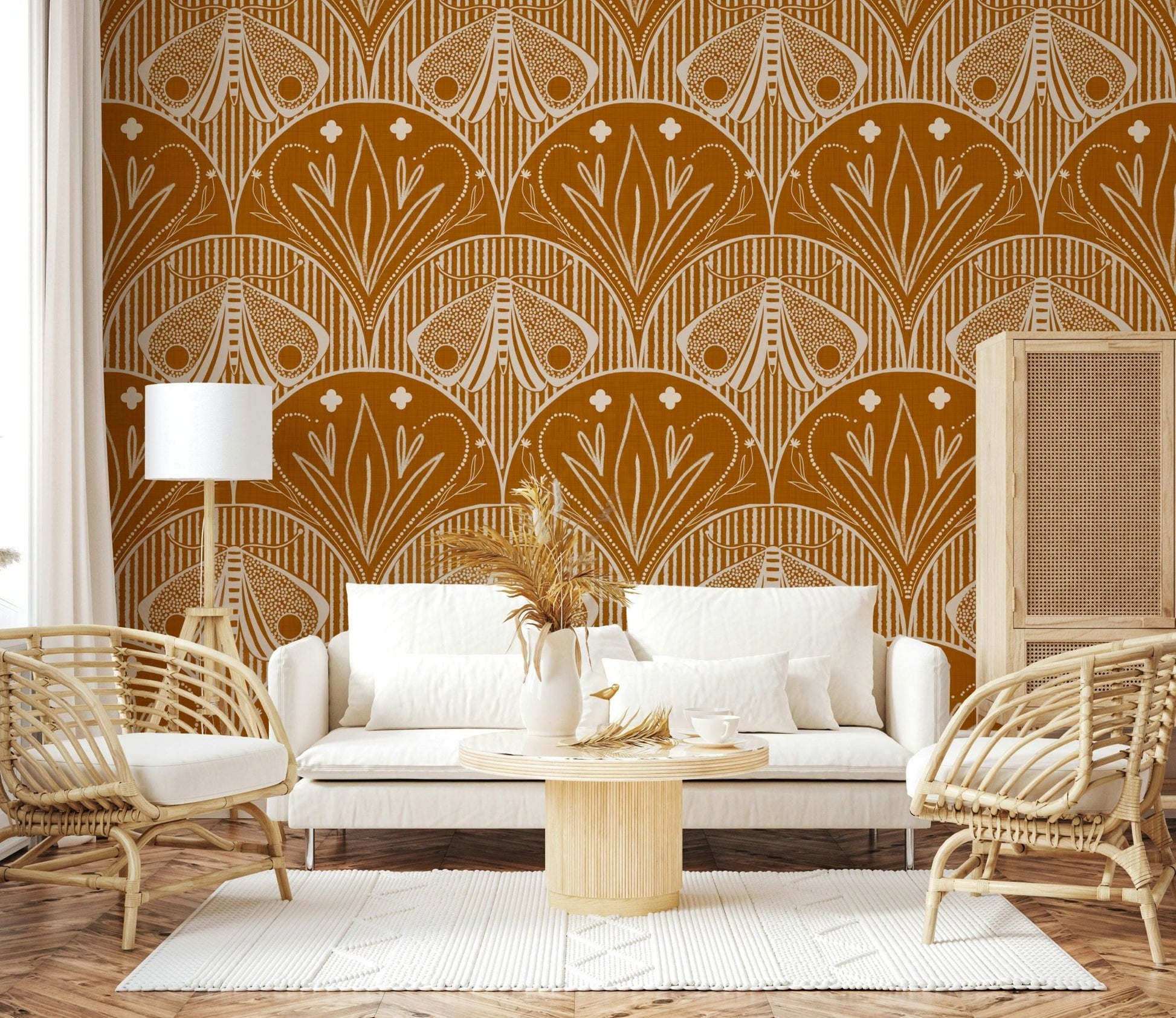 Boho Art Nouveau Scallop Butterfly Floral in Burnt Orange wallpaper mural behind a white sofa and rattan chairs