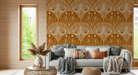 Boho Art Nouveau Scallop Butterfly Floral in Burnt Orange wallpaper mural behind a grey sofa with knit throws
