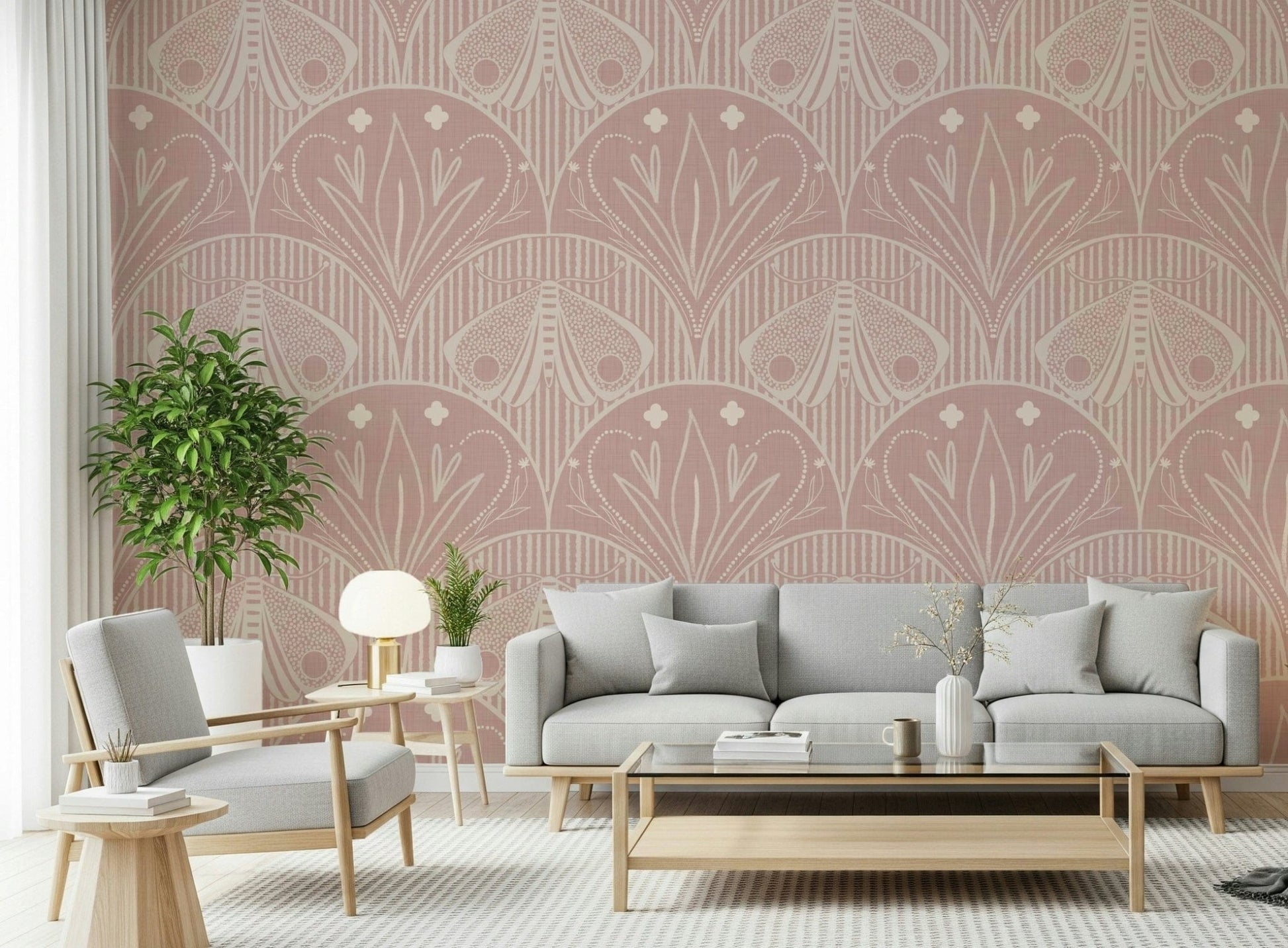 Boho Art Nouveau Scallop Butterfly Floral in Cream and Dust Pink wallpaper mural behind a grey sofa and armchair