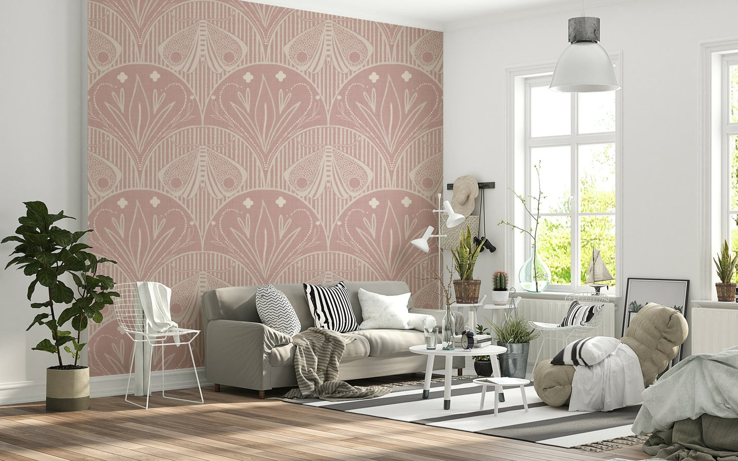 Boho Art Nouveau Scallop Butterfly Floral in Cream and Dust Pink wallpaper mural behind a grey sofa with striped cushions