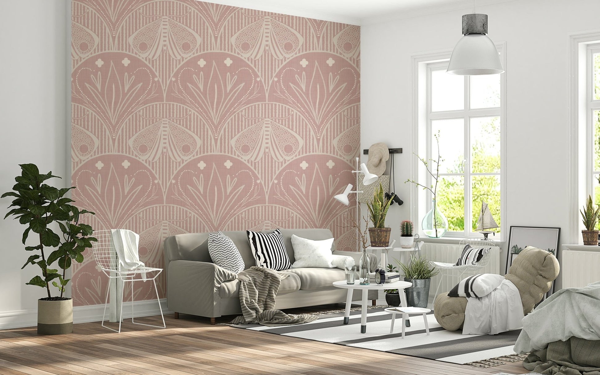 Boho Art Nouveau Scallop Butterfly Floral in Cream and Dust Pink wallpaper mural behind a grey sofa with striped cushions