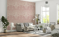 Boho Art Nouveau Scallop Butterfly Floral in Cream and Dust Pink wallpaper mural behind a grey sofa with striped cushions